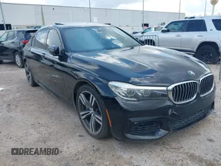 2018 BMW 7 Series 740i with VIN WBA7E2C50JG743153, listed as a IAAI auction lot 42725106 with Not provided miles and . Bid and sale history available at DreamBid. Image 1.