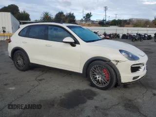 2012 Porsche Cayenne Turbo with VIN WP1AC2A23CLA81911, listed as a Copart auction lot 78679924 with 197,166 mi miles and Salvage title. Bid and sale history available at DreamBid. Image 4.