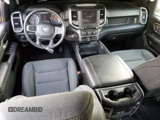 2022 Ram 1500 Big Horn with VIN 1C6SRFMT3NN265986, listed as a Copart auction lot 83177674 with 27,077 mi miles and Salvage title. Bid and sale history available at DreamBid. Image 8.