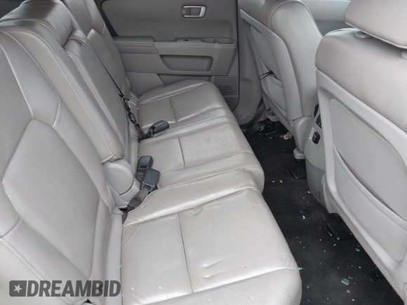 2012 Honda Pilot EX-L with VIN 5FNYF4H50CB011630, listed as a IAAI auction lot 42518876 with 92,494 mi miles and . Bid and sale history available at DreamBid. Image 8.