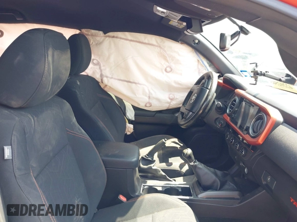 2017 Toyota Tacoma SR5 with VIN 5TFCZ5AN4HX091383, listed as a IAAI auction lot 42202505 with 82,000 mi miles and . Bid and sale history available at DreamBid. Image 5.