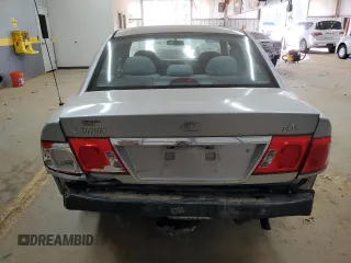2005 Kia Optima LX z VIN KNAGD128155423463, wystawiony jako Copart lot #87441284 z przebiegiem 143 193 mil mil oraz Szkoda całkowita • Salvage title. Historia ofert i sprzedaży dostępna na DreamBid. Obrazek 6.