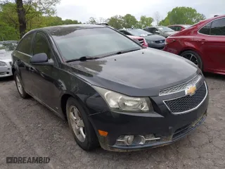 2011 Chevrolet Cruze LT w/2LT with VIN 1G1PG5S99B7246731, listed as a IAAI auction lot 42045728 with 124,000 mi miles. Bid and sale history available at carsss.com. Image 1.