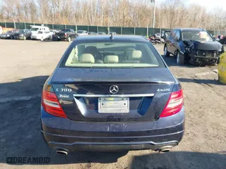 2014 Mercedes-Benz C-Class C 300 Sport with VIN WDDGF8ABXER319765, listed as a IAAI auction lot 41759219 with 117,637 mi miles. Bid and sale history available at carsss.com. Image 16.
