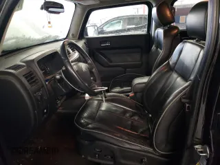 2009 Hummer H3 with VIN 5GNEN13EX98140981, listed as a Copart auction lot 87460374 with 111,362 mi miles and Salvage Title. Bid and sale history available at DreamBid. Image 7.
