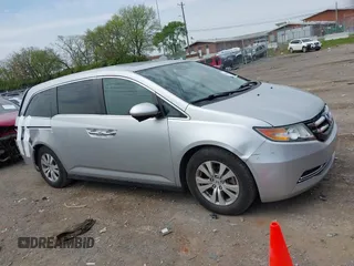 2014 Honda Odyssey EX-L with VIN 5FNRL5H60EB115792, listed as a IAAI auction lot 42064607 with 191,055 mi miles and . Bid and sale history available at carsss.com. Image 13.