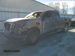 2016 Nissan Titan XD Platinum Reserve with VIN 1N6BA1F25GN502405, listed as a Copart auction lot 45528985 with 0 mi miles and Salvage Title. Bid and sale history available at carsss.com. Image 1.