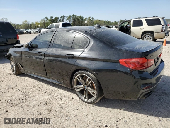 2020 BMW 5 Series M550i xDrive z VIN WBAJS7C01LCD23365, wystawiony jako Copart lot #49166705 z przebiegiem 42 293 mil mil oraz Szkoda całkowita • Salvage title. Historia ofert i sprzedaży dostępna na DreamBid. Obrazek 2.
