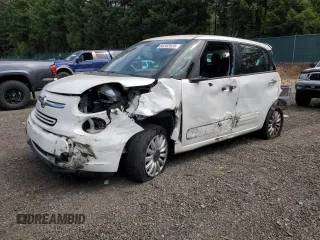 2014 FIAT 500L Easy with VIN ZFBCFABH5EZ023963, listed as a Copart auction lot 65202525 with 115,476 mi miles and Salvage title. Bid and sale history available at DreamBid. Image 1.