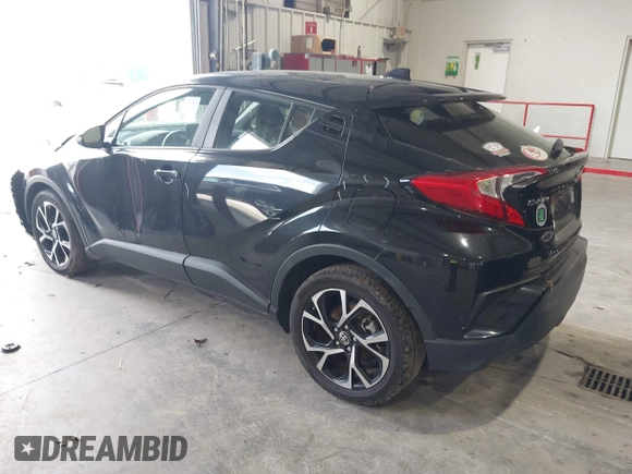 2020 Toyota C-HR LE with VIN JTNKHMBX1L1077957, listed as a IAAI auction lot 42159765 with 83,138 mi miles and . Bid and sale history available at DreamBid. Image 3.