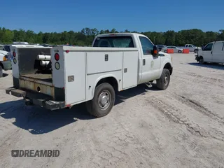 2014 Ford Super Duty F-250 SRW XL with VIN 1FDBF2B67EEA49254, listed as a IAAI auction lot 42136208 with 209,139 mi miles. Bid and sale history available at carsss.com. Image 4.