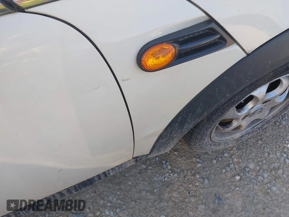 2013 MINI Hardtop with VIN WMWSU3C5XDT687396, listed as a IAAI auction lot 42669510 with 116,143 mi miles and . Bid and sale history available at DreamBid. Image 6.