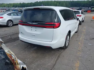 2023 Chrysler Pacifica Touring L with VIN 2C4RC1BG8PR535446, listed as a IAAI auction lot 42307923 with 65,718 mi miles and . Bid and sale history available at DreamBid. Image 4.