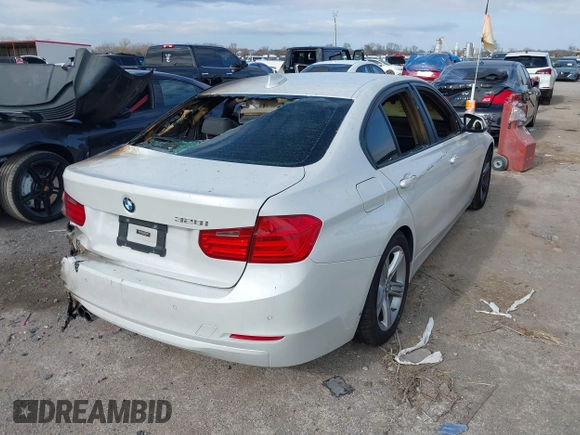 2014 BMW 3 Series 328i with VIN WBA3C1C59EK108868, listed as a IAAI auction lot 41108653 with Not Provided miles and . Bid and sale history available at carsss.com. Image 4.