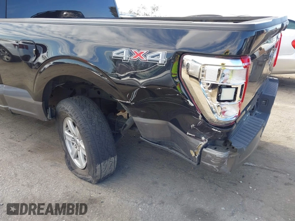 2022 Ford F-150 XL with VIN 1FTMF1E56NKE03194, listed as a IAAI auction lot 41620978 with 76,689 mi miles and . Bid and sale history available at DreamBid. Image 6.