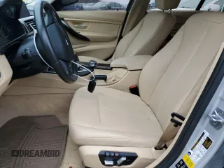 2016 BMW 3 Series 320i xDrive with VIN WBA8A3C57GK688602, listed as a Copart auction lot 84408424 with 74,498 mi miles and Salvage Title. Bid and sale history available at DreamBid. Image 7.