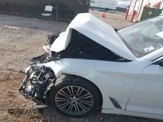 2018 BMW 5 Series 530i with VIN WBAJA5C5XJWA56855, listed as a IAAI auction lot 41128814 with Not Provided miles and . Bid and sale history available at DreamBid. Image 18.