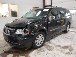 2012 Chrysler Town & Country Touring L with VIN 2C4RC1CGXCR170910, listed as a IAAI auction lot 41911179 with 167,850 mi miles and . Bid and sale history available at carsss.com. Image 2.