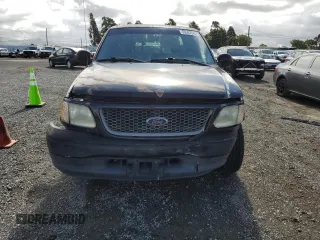 2001 Ford F-150 XL with VIN 1FTRX17W91NB71630, listed as a Copart auction lot 56583545 with 209,009 mi miles and Salvage title. Bid and sale history available at DreamBid. Image 5.