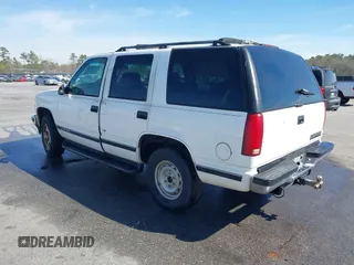 1999 Chevrolet Tahoe Z71 with VIN 1GNEK13R3XJ412067, listed as a IAAI auction lot 41789660 with 196,916 mi miles and . Bid and sale history available at DreamBid. Image 3.