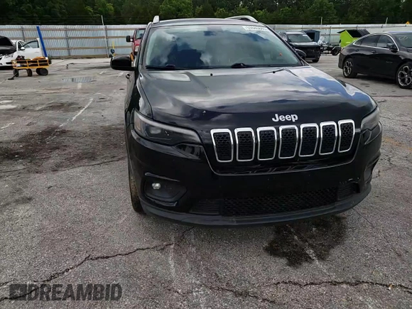 2019 Jeep Cherokee Latitude with VIN 1C4PJLCX7KD331871, listed as a Copart auction lot 59685665 with 90,787 mi miles and Salvage title. Bid and sale history available at DreamBid. Image 14.