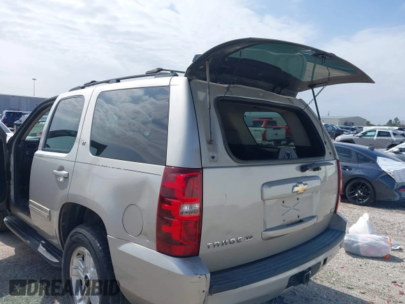 2009 Chevrolet Tahoe 2LT z VIN 1GNEC23379R258434, wystawiony jako IAAI lot #41558672 z przebiegiem 133 646 mil mil oraz . Historia ofert i sprzedaży dostępna na DreamBid. Obrazek 17.