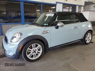 2012 MINI Convertible S with VIN WMWZP3C55CT249664, listed as a Copart auction lot 63120145 with 59,197 mi miles and Salvage title. Bid and sale history available at DreamBid. Image 1.