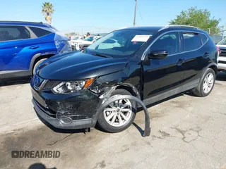 2019 Nissan Rogue Sport S with VIN JN1BJ1CPXKW233049, listed as a IAAI auction lot 42004455 with 63,427 mi miles. Bid and sale history available at carsss.com. Image 18.