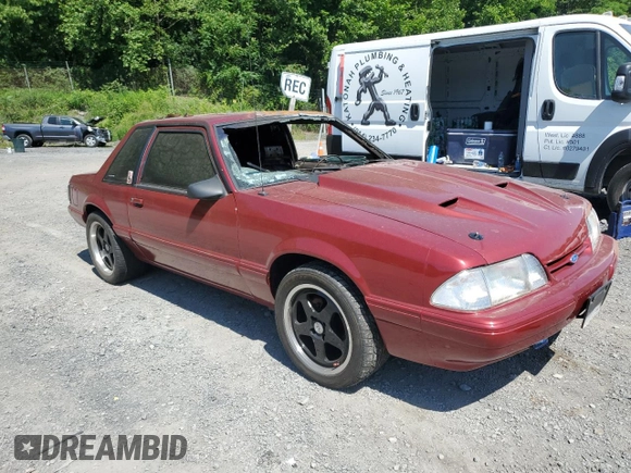 1990 Ford Mustang with VIN 1FACP40E5LF223413, listed as a Copart auction lot 62114315 with Not provided miles and Salvage title. Bid and sale history available at DreamBid. Image 4.