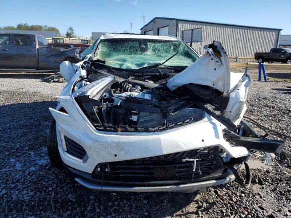 2024 Cadillac XT5 FWD Premium Luxury with VIN 1GYKNCRS5RZ739383, listed as a Copart auction lot 82047614 with Not provided miles and Salvage title. Bid and sale history available at DreamBid. Image 5.