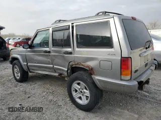 2001 Jeep Cherokee Sport z VIN 1J4FF58SX1L576572, wystawiony jako Copart lot #48982965 z przebiegiem 174 500 mil mil oraz Szkoda całkowita • Salvage title. Historia ofert i sprzedaży dostępna na DreamBid. Obrazek 2.
