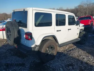 2021 Jeep Wrangler Unlimited Sahara with VIN 1C4HJXEG1MW597905, listed as a IAAI auction lot 41327138 with Not provided miles and . Bid and sale history available at DreamBid. Image 4.
