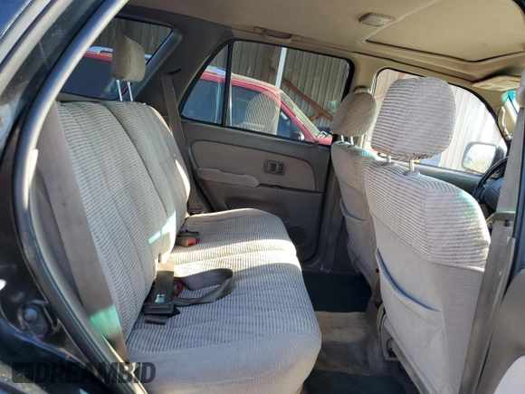 1997 Toyota 4Runner SR5 z VIN JT3HN86RXV0100711, wystawiony jako Copart lot #56483995 z przebiegiem 184 667 mil mil oraz Szkoda całkowita • Salvage title. Historia ofert i sprzedaży dostępna na DreamBid. Obrazek 11.