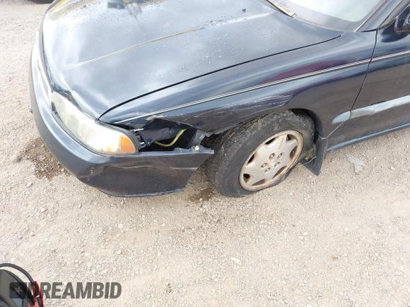 1995 Subaru Legacy L with VIN 4S3BD6353S7226373, listed as a IAAI auction lot 41912014 with 141,304 mi miles and . Bid and sale history available at DreamBid. Image 6.
