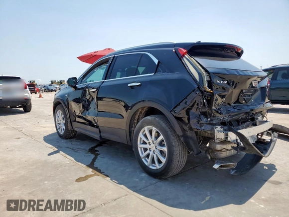 2023 Cadillac XT4 FWD Luxury z VIN 1GYAZAR42PF102696, wystawiony jako Copart lot #60524065 z przebiegiem 1 903 mil mil oraz Szkoda całkowita • Salvage title. Historia ofert i sprzedaży dostępna na DreamBid. Obrazek 2.