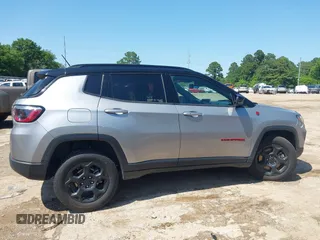 2023 Jeep Compass Trailhawk with VIN 3C4NJDDN3PT527995, listed as a IAAI auction lot 42218464 with 47,701 mi miles and . Bid and sale history available at carsss.com. Image 13.