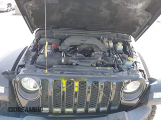 2021 Jeep Gladiator Rubicon z VIN 1C6JJTBG6ML535939, wystawiony jako IAAI lot #42260764 z przebiegiem 114 060 mil mil oraz . Historia ofert i sprzedaży dostępna na DreamBid. Obrazek 10.