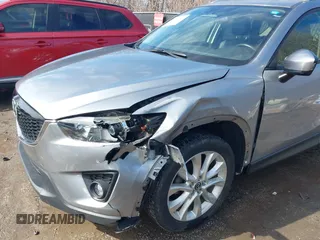 2014 Mazda CX-5 Grand Touring with VIN JM3KE2DY8E0375025, listed as a IAAI auction lot 41657755 with 103,601 mi miles. Bid and sale history available at carsss.com. Image 6.