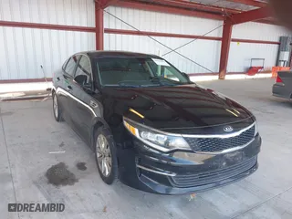 2016 Kia Optima LX with VIN 5XXGT4L33GG064125, listed as a IAAI auction lot 39506983 with 131,976 mi miles. Bid and sale history available at carsss.com. Image 1.