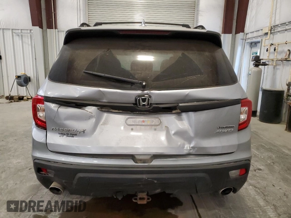 2020 Honda Passport Touring z VIN 5FNYF8H90LB001755, wystawiony jako Copart lot #75434854 z przebiegiem 48 984 mil mil oraz Szkoda całkowita • Salvage title. Historia ofert i sprzedaży dostępna na DreamBid. Obrazek 6.
