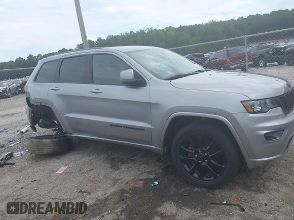 2018 Jeep Grand Cherokee Laredo E z VIN 1C4RJEAG5JC404022, wystawiony jako IAAI lot #42586412 z przebiegiem 95 798 mil mil oraz . Historia ofert i sprzedaży dostępna na DreamBid. Obrazek 13.
