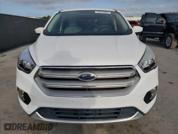 2019 Ford Escape SE z VIN 1FMCU9GD9KUA02481, wystawiony jako Copart lot #57919925 z przebiegiem 63 874 mil mil oraz Czysty tytuł • Clean title. Historia ofert i sprzedaży dostępna na DreamBid. Obrazek 5.