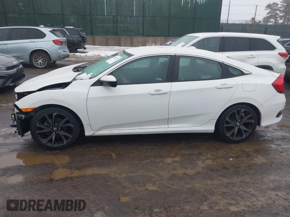 2020 Honda Civic Sedan Sport with VIN 19XFC2F83LE215734, listed as a IAAI auction lot 41553147 with 31,337 mi miles. Bid and sale history available at carsss.com. Image 14.