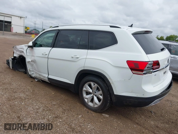 2019 Volkswagen Atlas SE with VIN 1V2UR2CA0KC560799, listed as a IAAI auction lot 42318671 with 95,804 mi miles and . Bid and sale history available at DreamBid. Image 3.