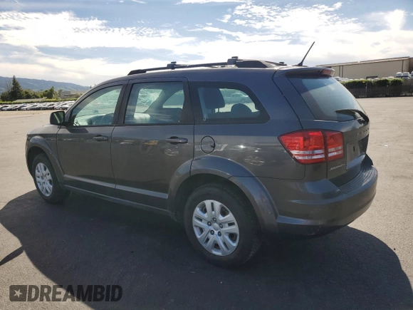 2014 Dodge Journey SE with VIN 3C4PDCABXET308940, listed as a Copart auction lot 52049255 with 119,955 mi miles and Salvage Title. Bid and sale history available at carsss.com. Image 2.
