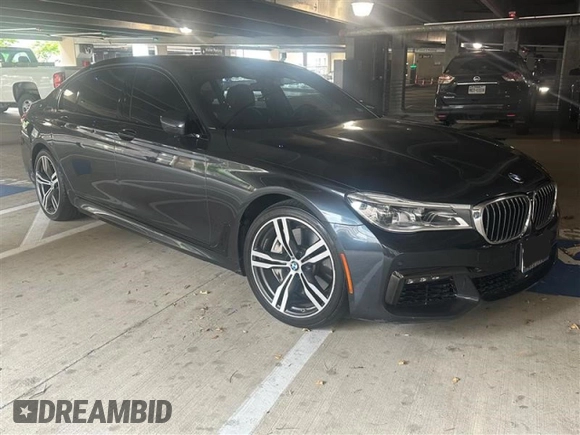 2016 BMW 7 Series 750i xDrive with VIN WBA7F2C51GG415746, listed as a Copart auction lot 50784393 with 73,117 mi miles. Bid and sale history available at carsss.com. Image 2.