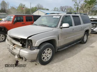 2005 Chevrolet Suburban Z71 z VIN 3GNFK16ZX5G110659, wystawiony jako Copart lot #51700115 z przebiegiem 223 329 mil mil oraz Szkoda całkowita • Salvage title. Historia ofert i sprzedaży dostępna na DreamBid. Obrazek 1.