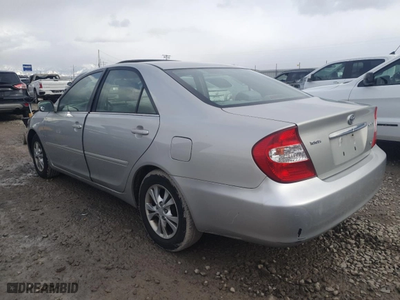 2004 Toyota Camry LE with VIN 4T1BF32K04U574924, listed as a Copart auction lot 48259895 with 134,239 mi miles and Salvage Title. Bid and sale history available at carsss.com. Image 2.