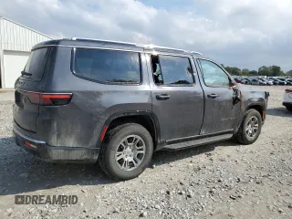 2023 Jeep Wagoneer z VIN 1C4SJVAT1PS514577, wystawiony jako Copart lot #73935334 z przebiegiem 34 250 mil mil oraz Nie do naprawy • Non repairable. Historia ofert i sprzedaży dostępna na DreamBid. Obrazek 3.