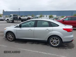 2015 Ford Focus SE z VIN 1FADP3F21FL218369, wystawiony jako IAAI lot #42126986 z przebiegiem 99 844 mil mil oraz . Historia ofert i sprzedaży dostępna na DreamBid. Obrazek 14.